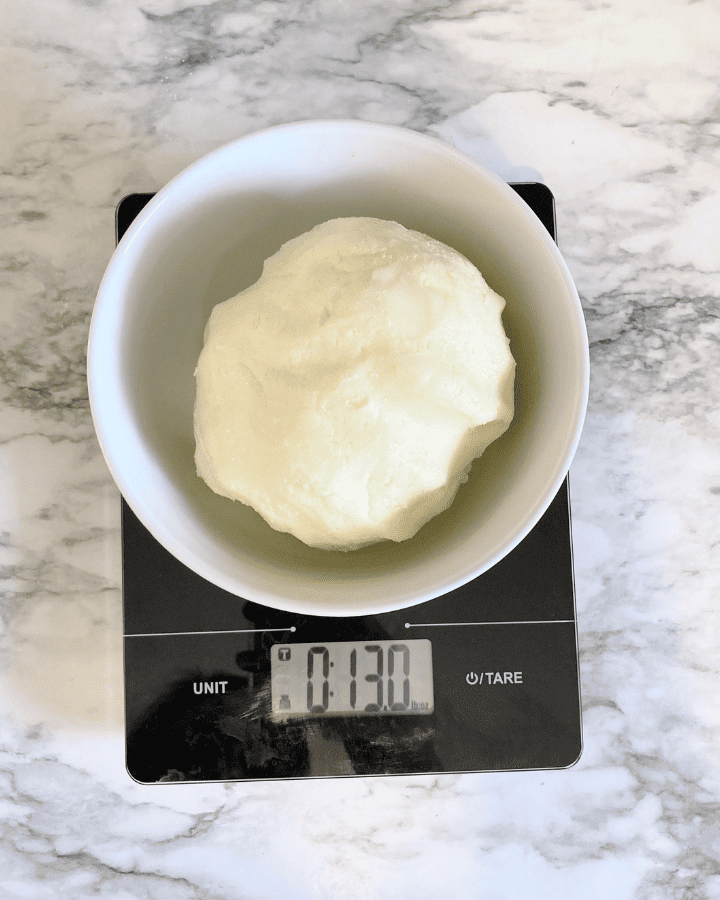 weighing the finished butter made from heavy cream